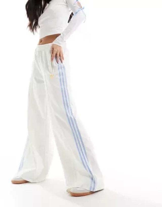 adidas Originals three stripe track pants in off white and blue | ASOS